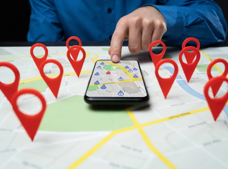pins and locations on a map with mobile